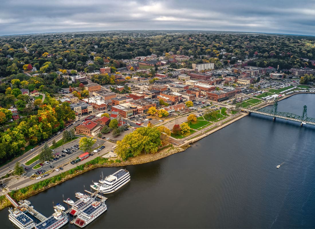 Stillwater, MN - Aerial View of the Twin Cities Suburb of Stillwater, Minnesota With Calm Skies and a Calm Lake